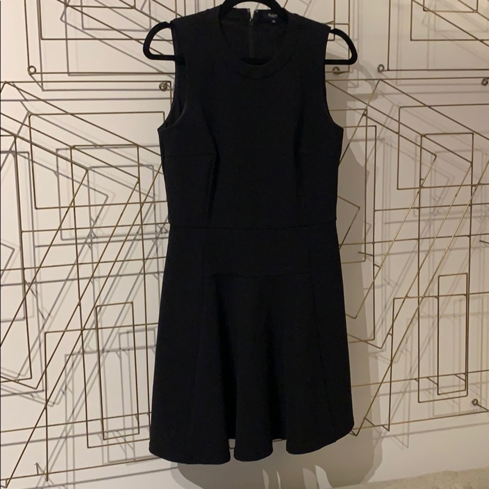 A line, sleeveless staple dress